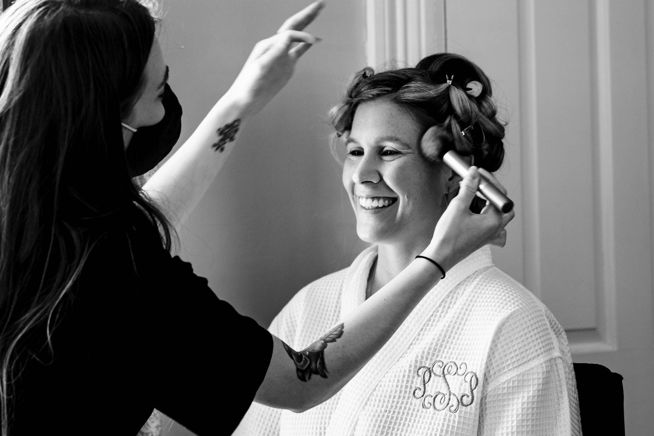 Bride getting make up done by Brides Side Beauty at the Beaufort Inn by Wedding Photographer Susan DeLoach Photography