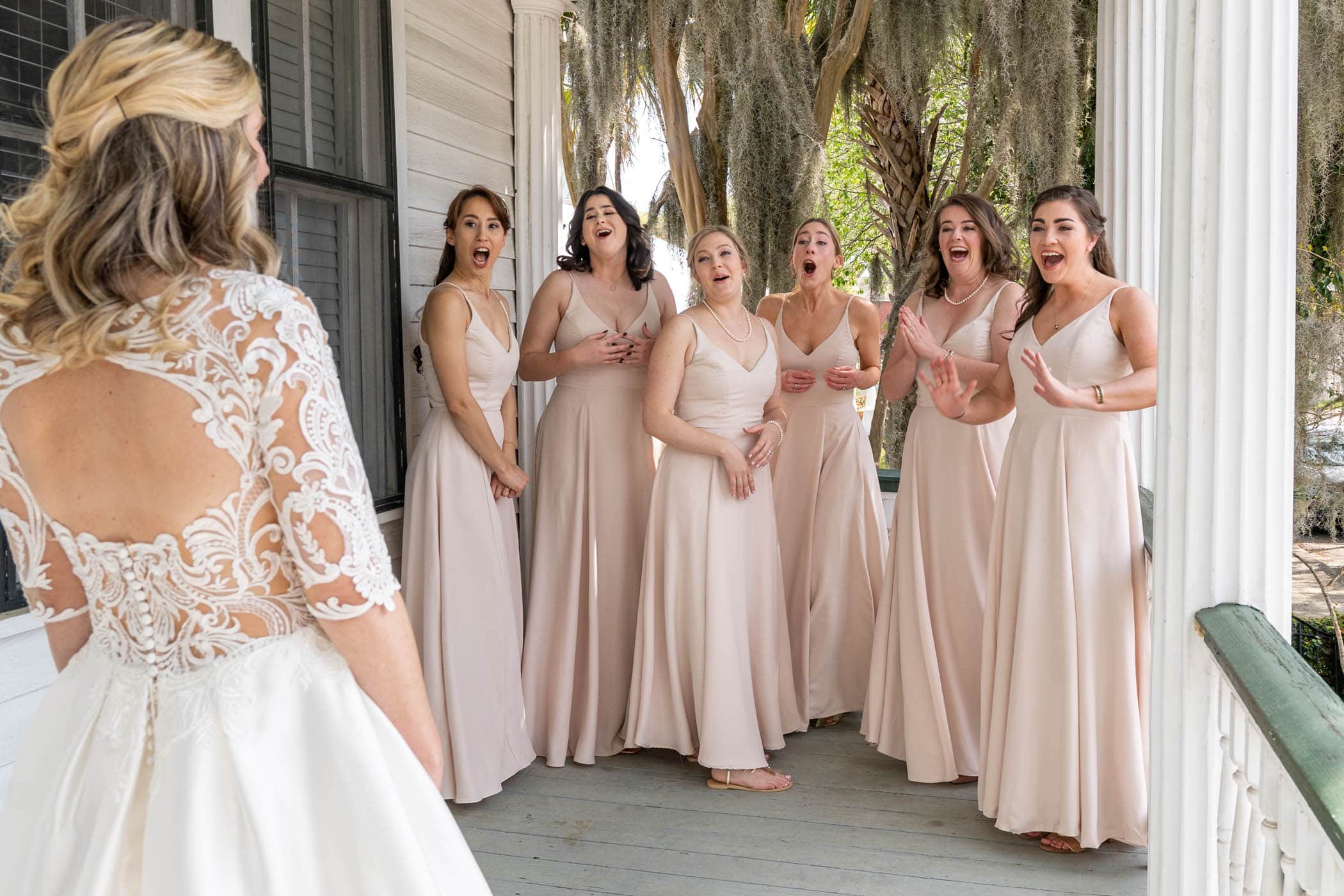 First Look with Bride and Bridesmaids at The Beaufort Inn by Wedding Photographer Susan DeLoach Photography