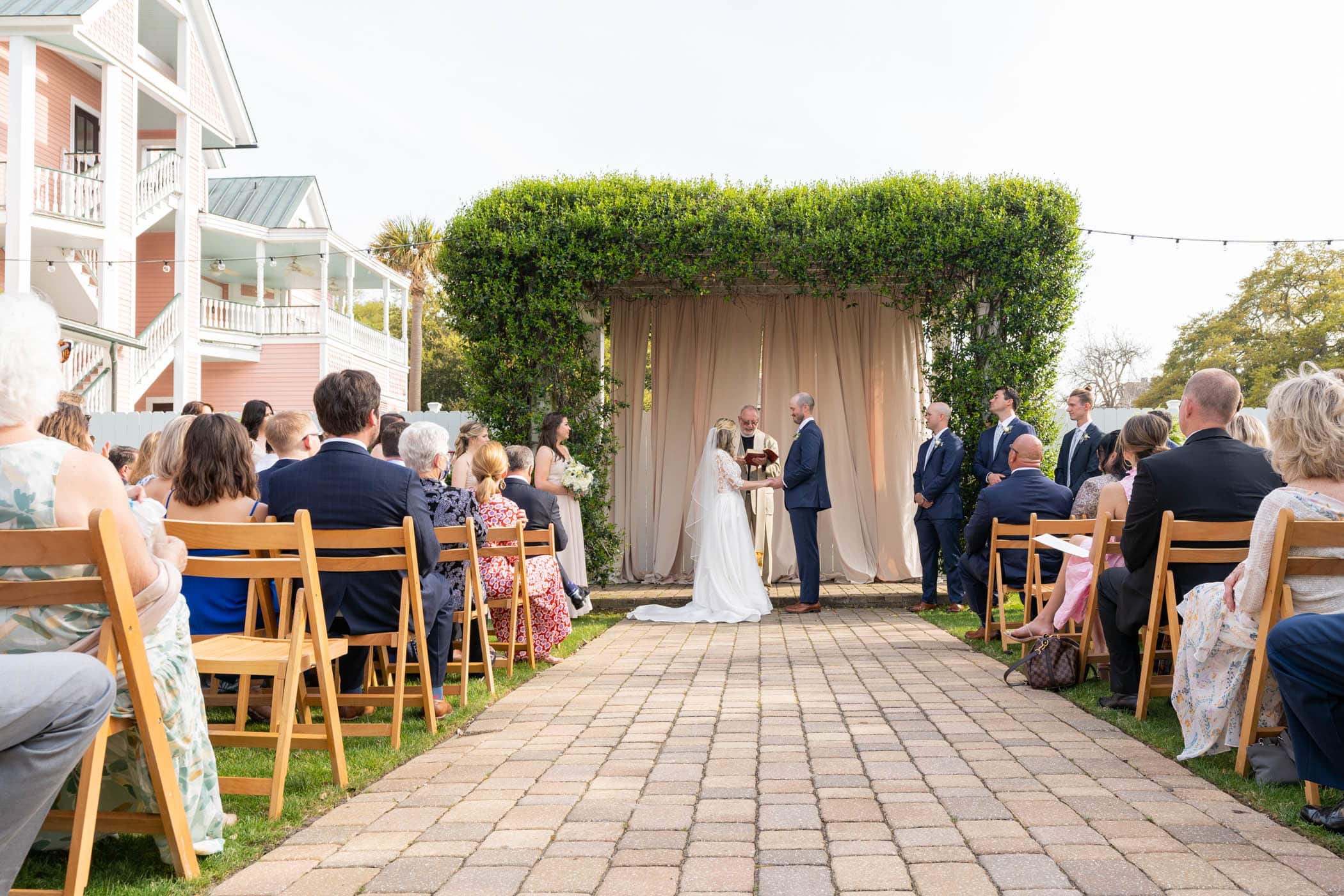 Wedding Ceremony in The Tabby Garden at The Beaufort Inn by Wedding Photographer Susan DeLoach Photography