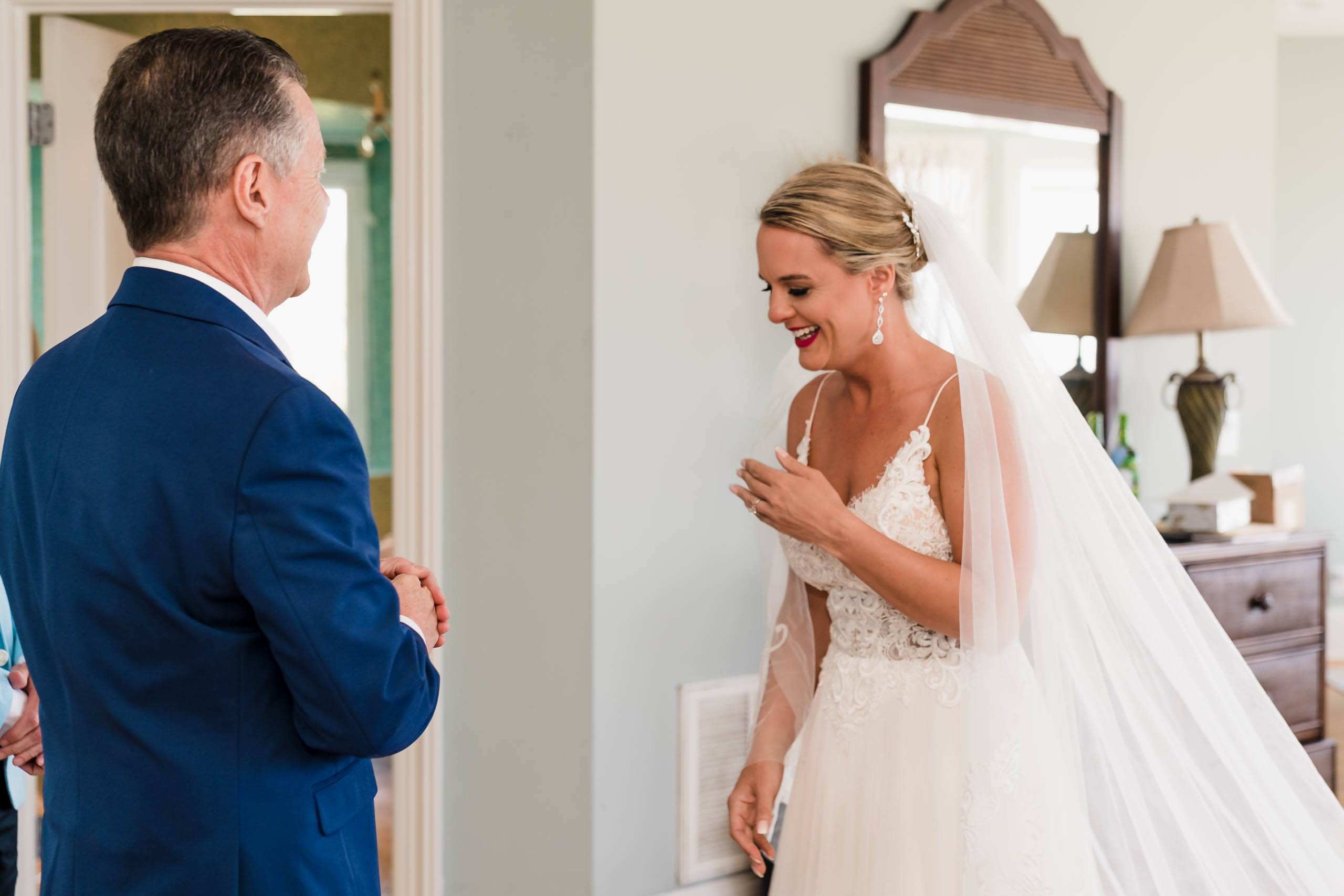 Bride with father during first look in beach house on Fripp Island by Susan DeLoach Photography SC wedding photographer 