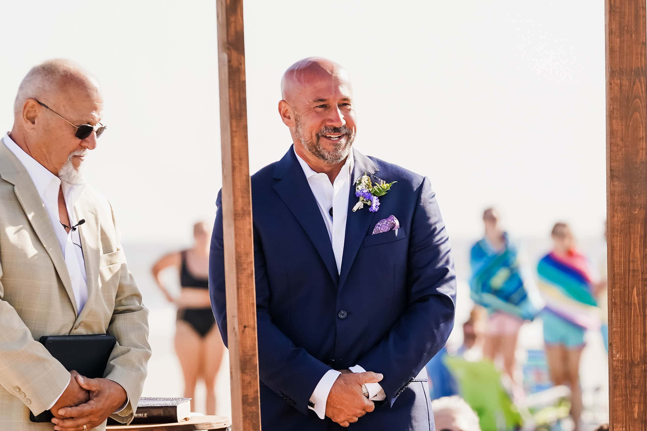 Groom on the beach seeing Bride walk down isle on Fripp Island by Susan DeLoach Photography SC Wedding photographer