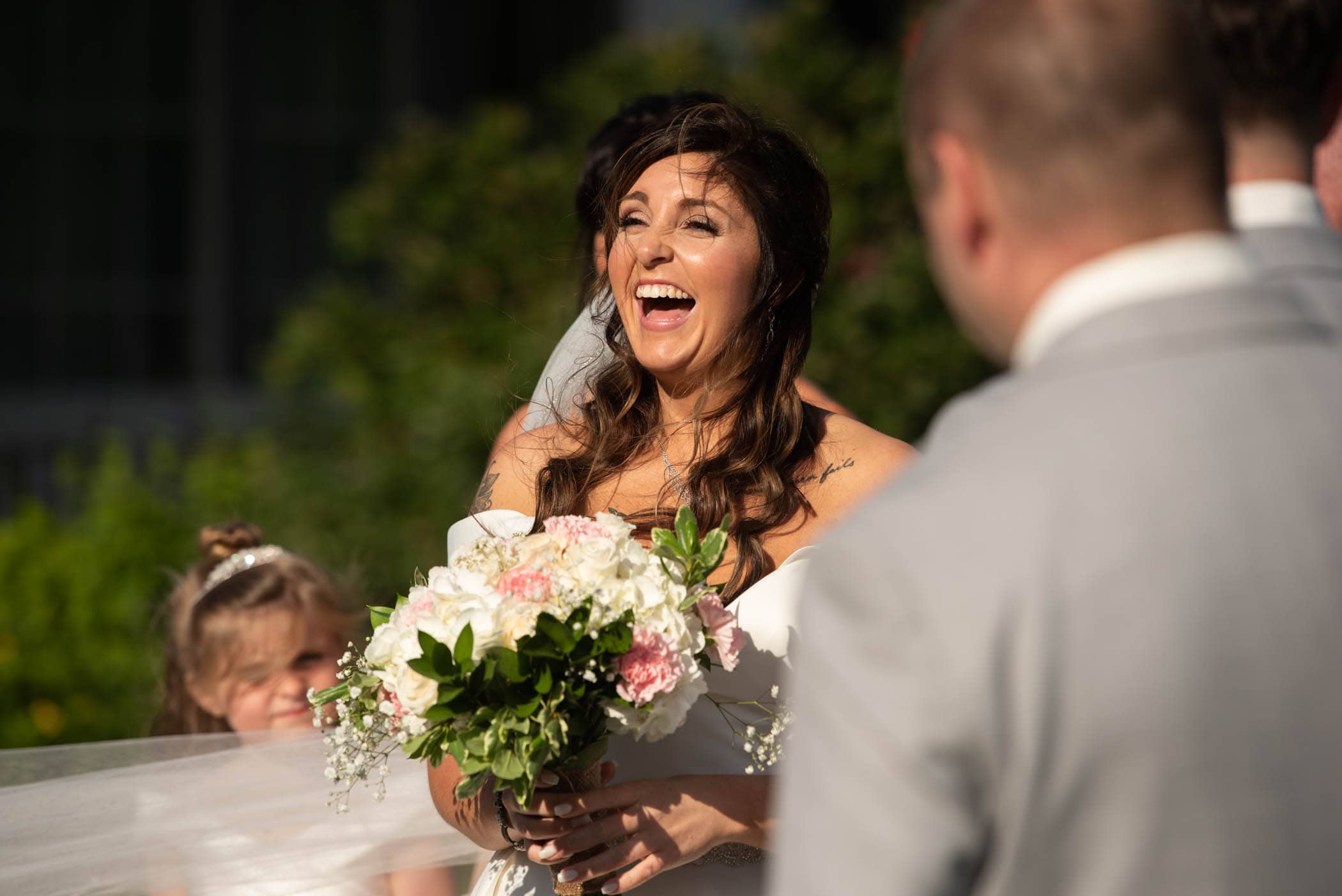 Smiling and laughing bride during wedding ceremony Dataw Island Club House by Susan DeLoach Photography SC wedding photographers