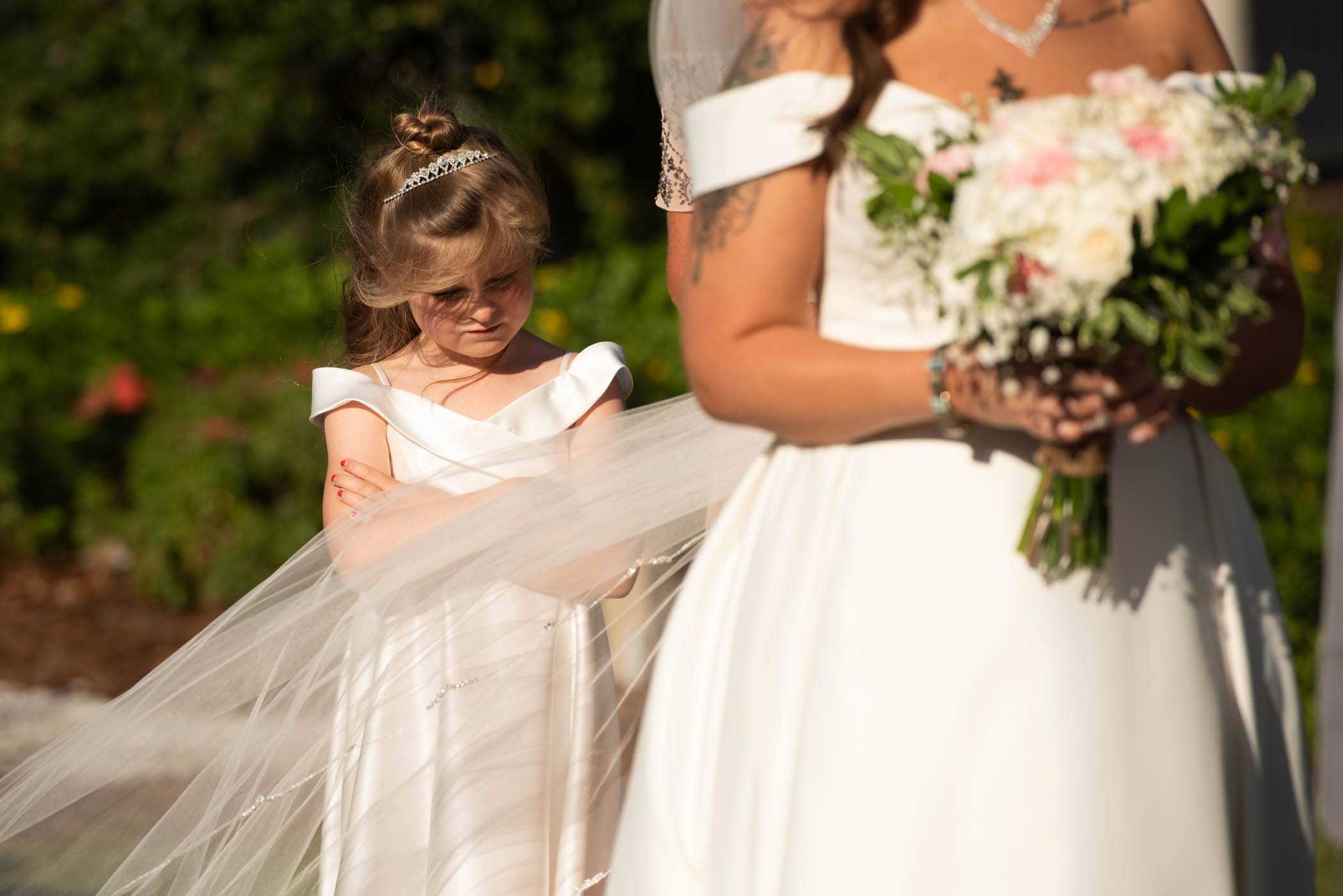 Pouting flower girl at wedding Dataw Island Club House by Susan DeLoach Photography SC wedding photographers