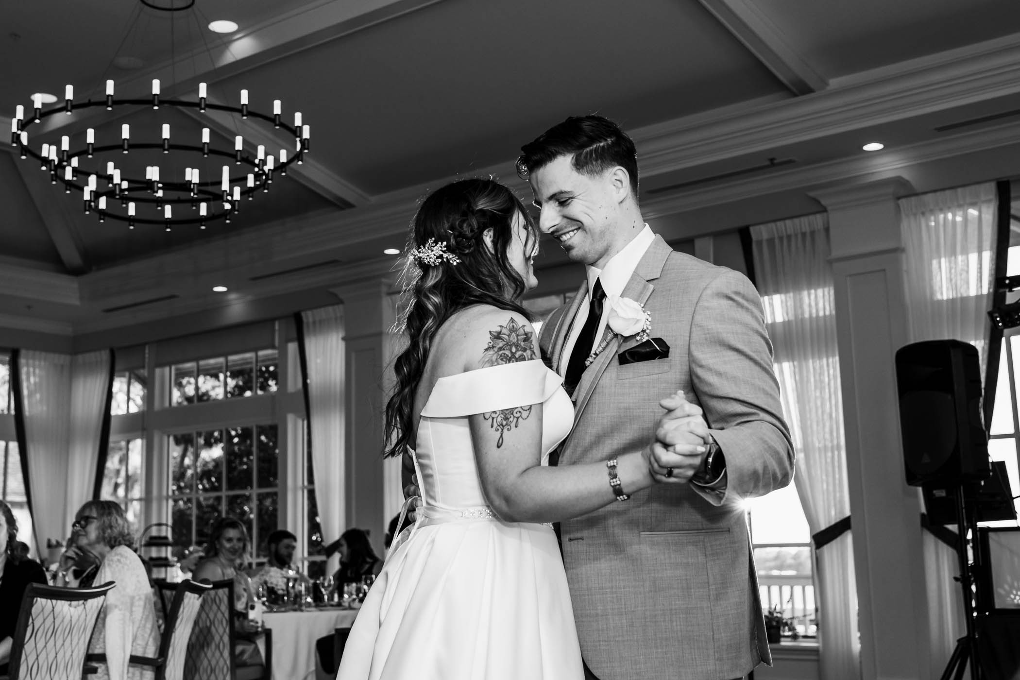 Bride and smiling groom dancing Dataw Island Club House by Susan DeLoach Photography SC wedding photographers