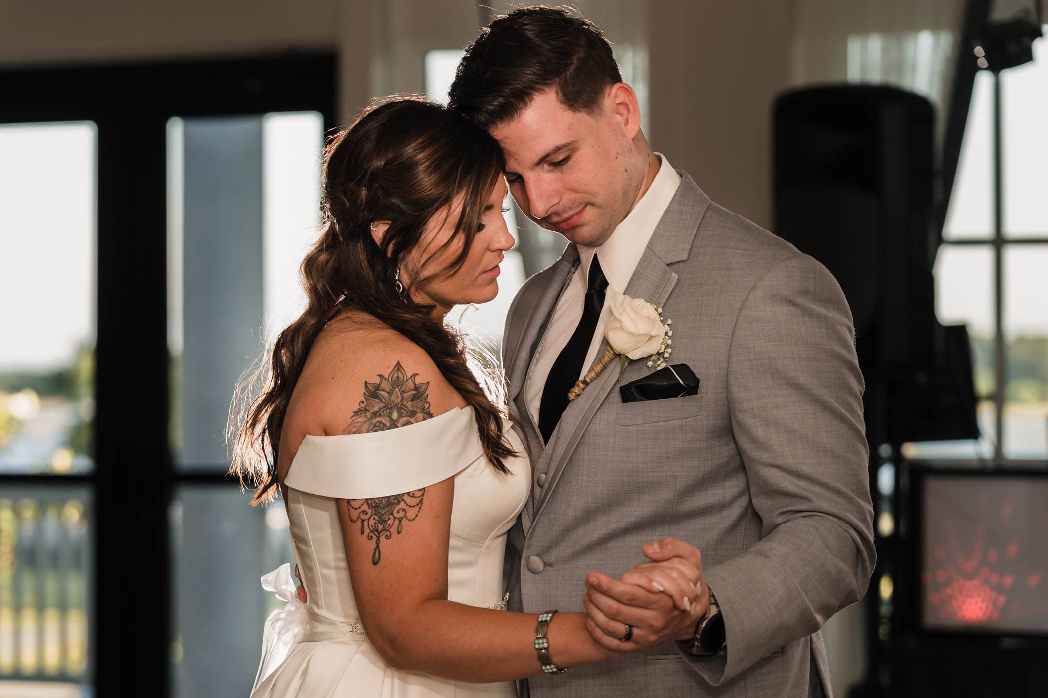 Bride and Groom dancing like they are the only ones in the room on Dataw Island Club House by Susan DeLoach Photography SC wedding photographers