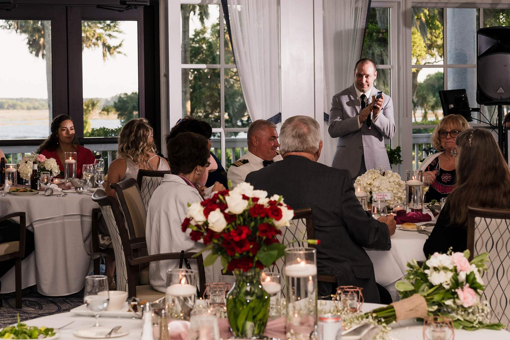 Best Man at a wedding giving a toast Dataw Island Club House by Susan DeLoach Photography SC wedding photographers