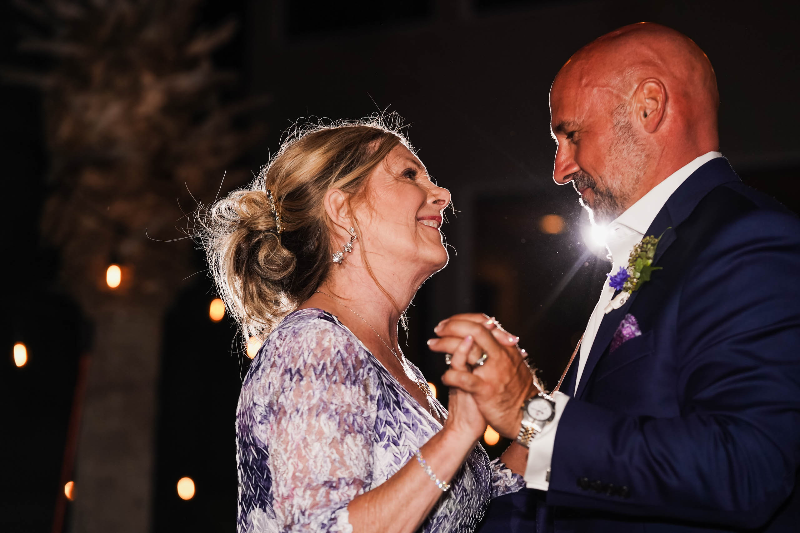 Groom dancing with the mother of the bride at Fripp Island beach wedding by Susan DeLoach Photography SC wedding photographer 