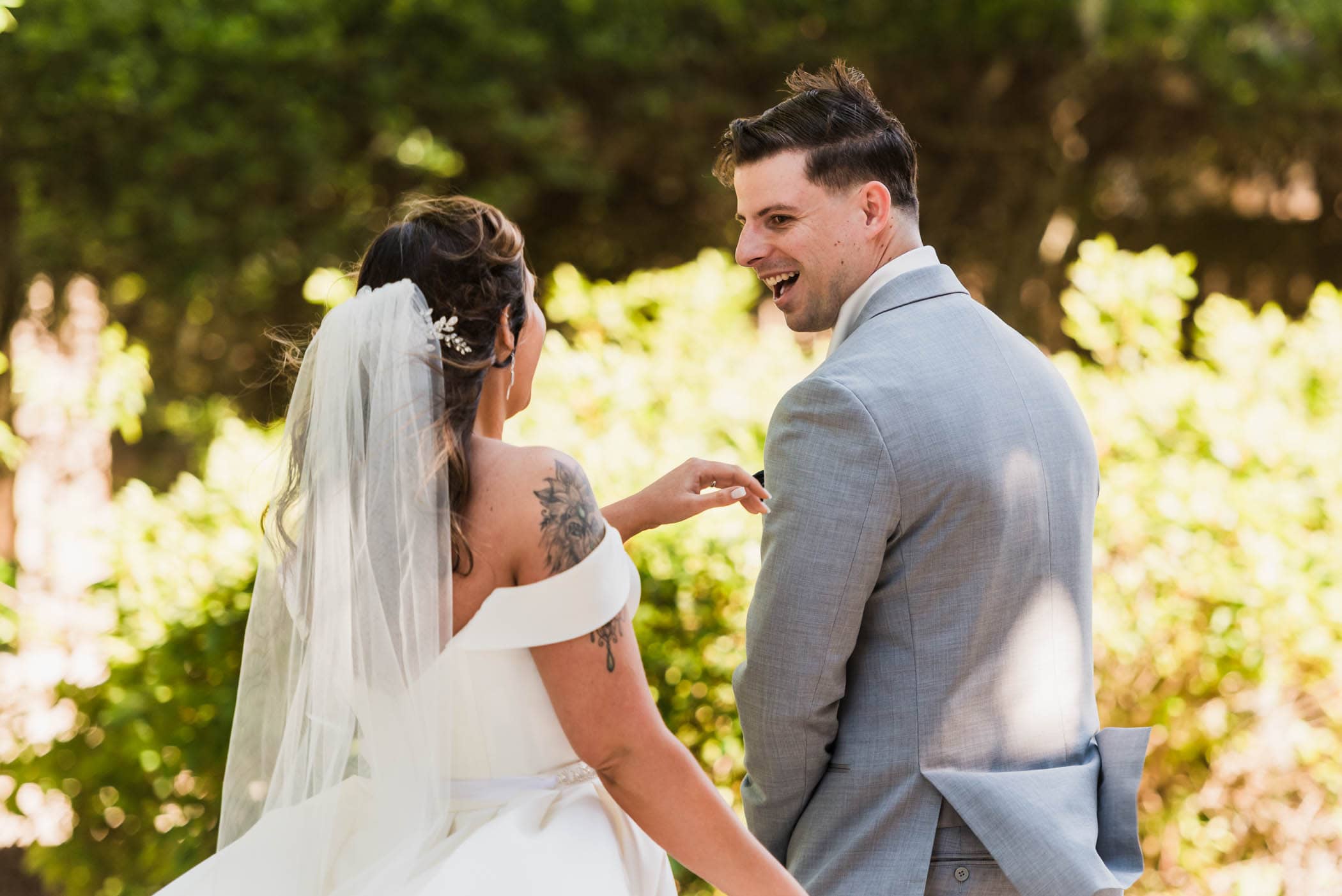 Groom seeing bride at first look by Susan DeLoach Photography SC wedding photographers